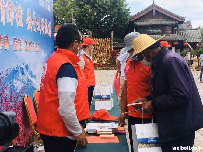 重走石鼓 发放惠民券 丽江举行中国旅游日系列活动 (6).jpg
