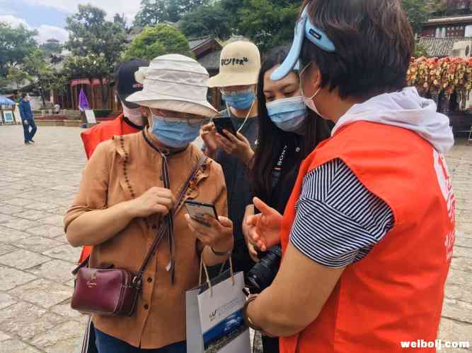 重走石鼓 发放惠民券 丽江举行中国旅游日系列活动 (5).jpg
