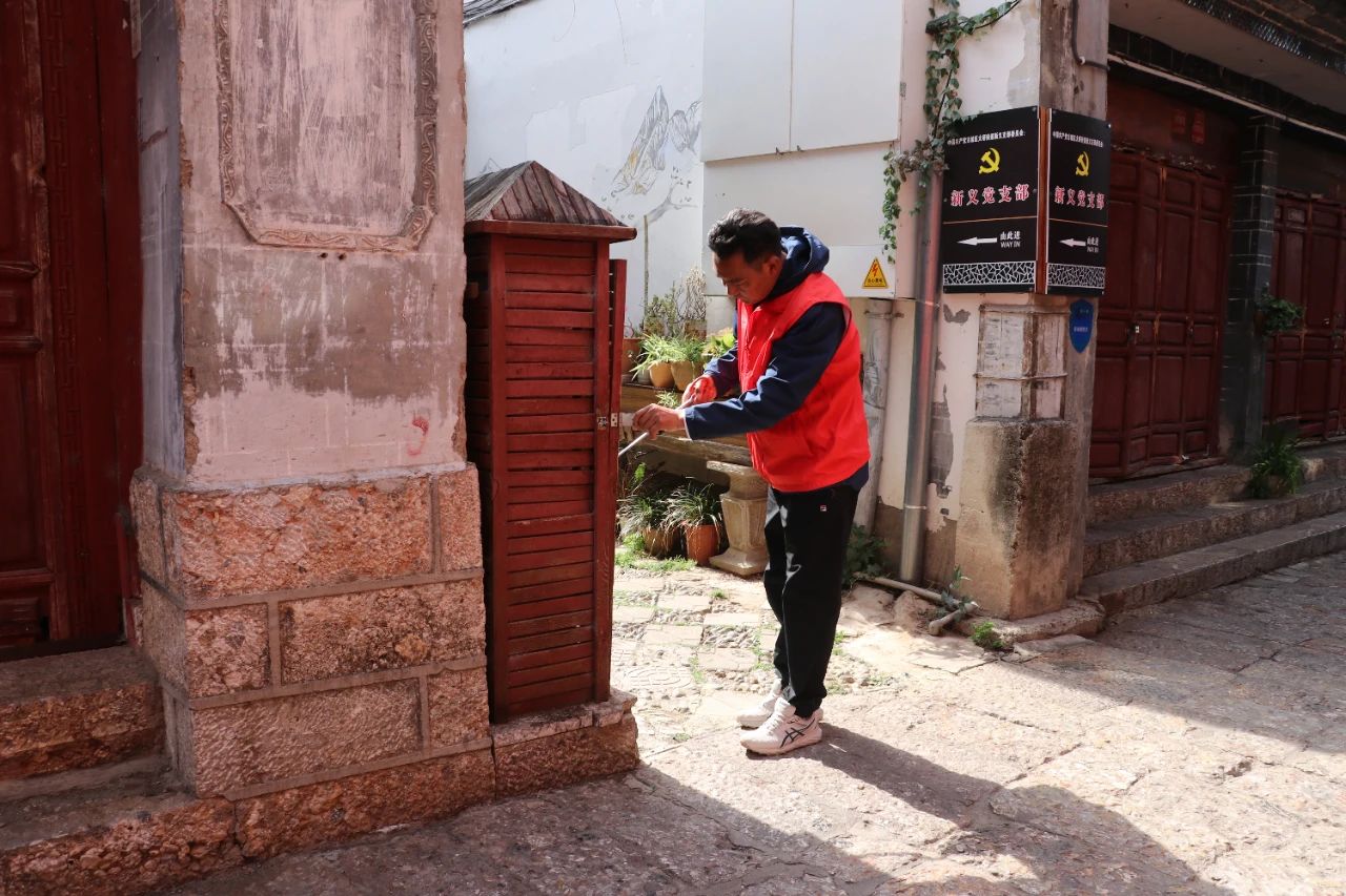 “5·19中国旅游日” 古城保护管理局（公司）开展志愿服务活动4.jpg